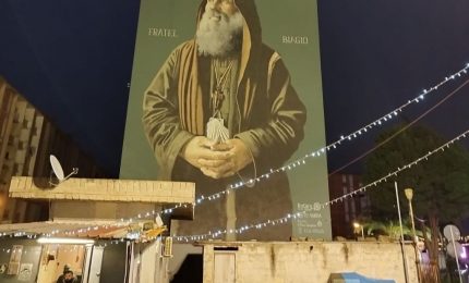 Sinergia Amg Energia-Comune Palermo, illuminato murale di Biagio Conte